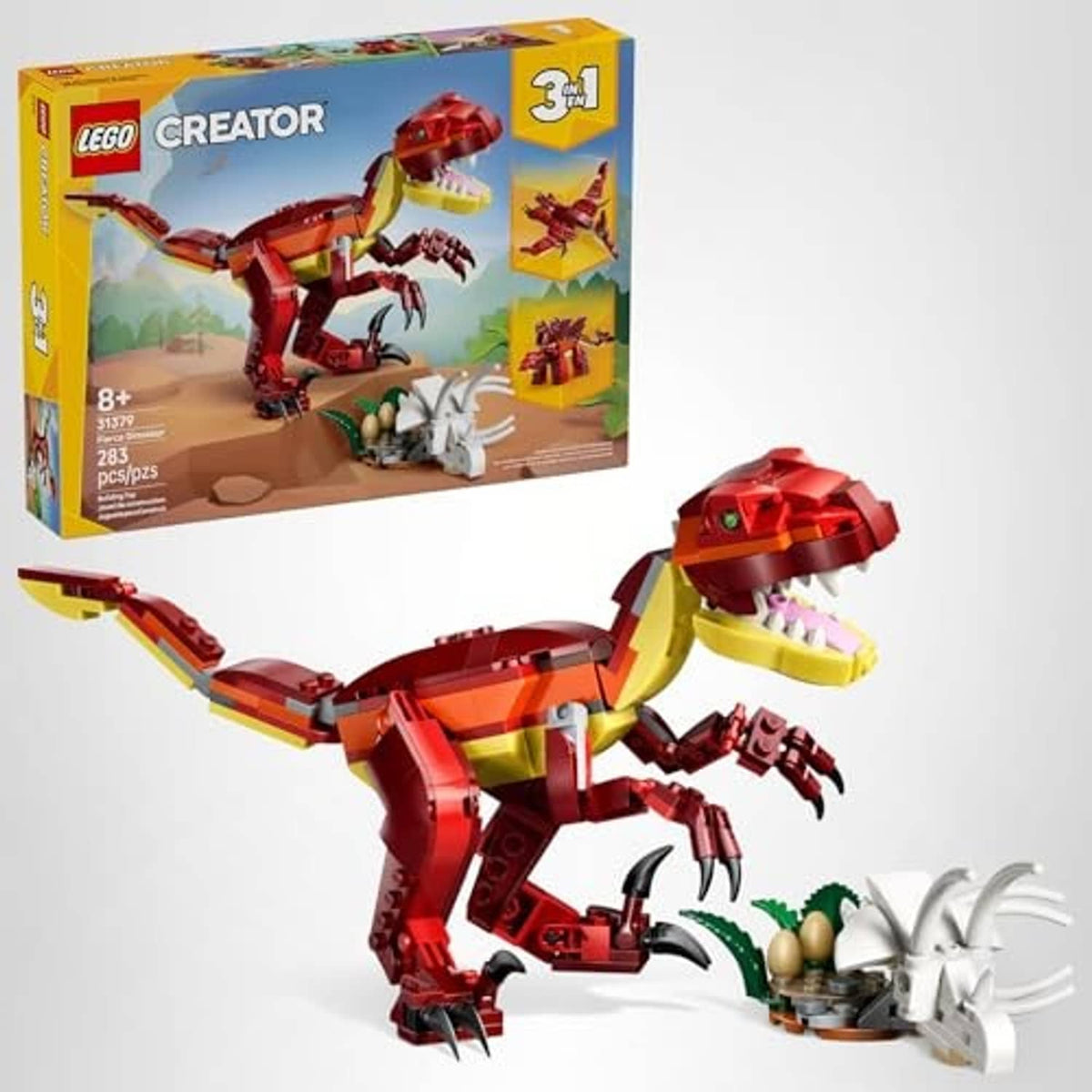 LEGO Creator fierce dinosaur building set with box and assembled red, yellow, and white dinosaur