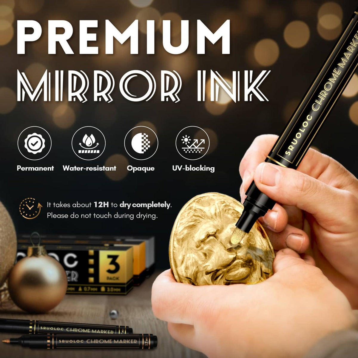 Hand holding chrome liquid paint marker on metallic ornament, premium mirror ink