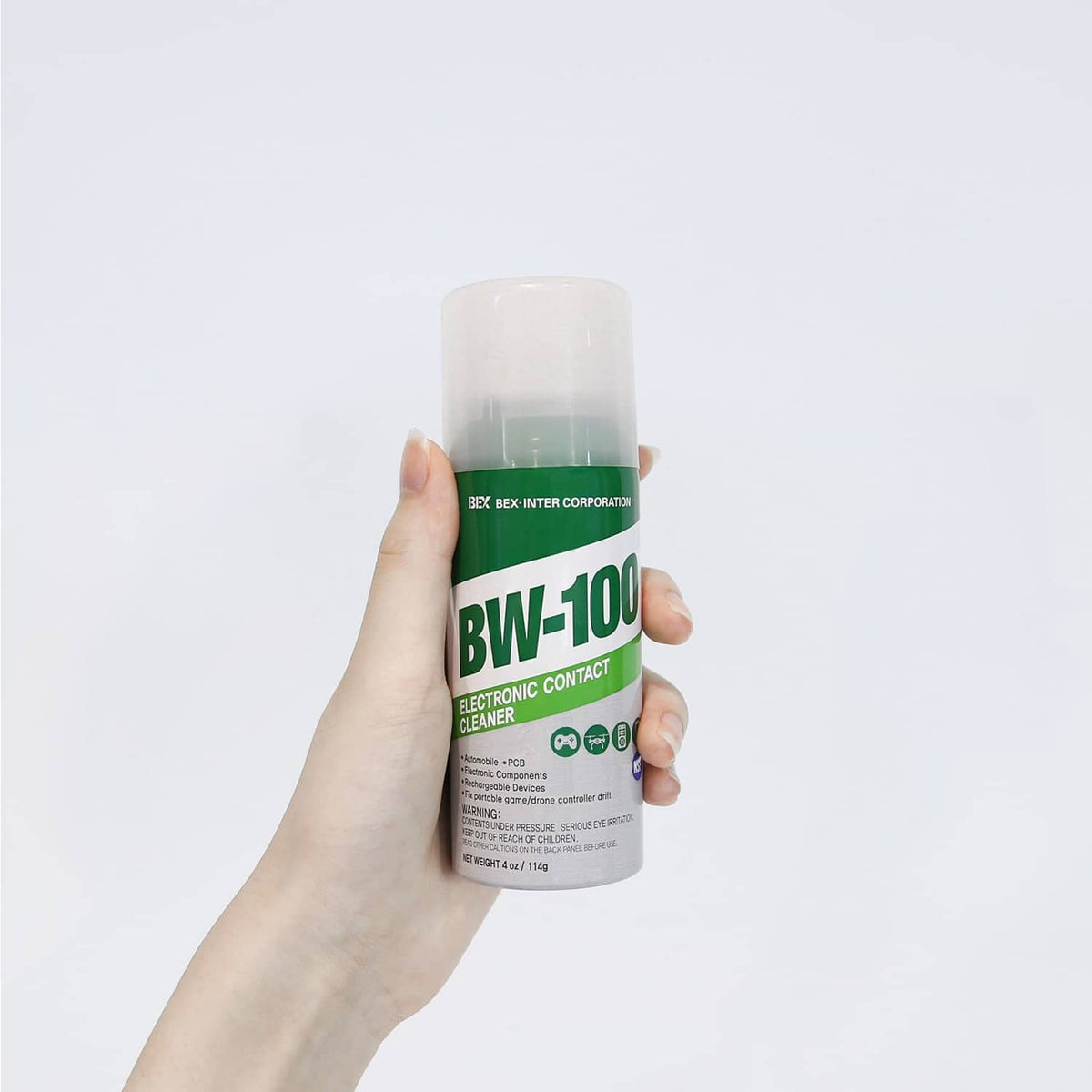 BW-100 electronic contact cleaner spray bottle held in hand, white cap and green label