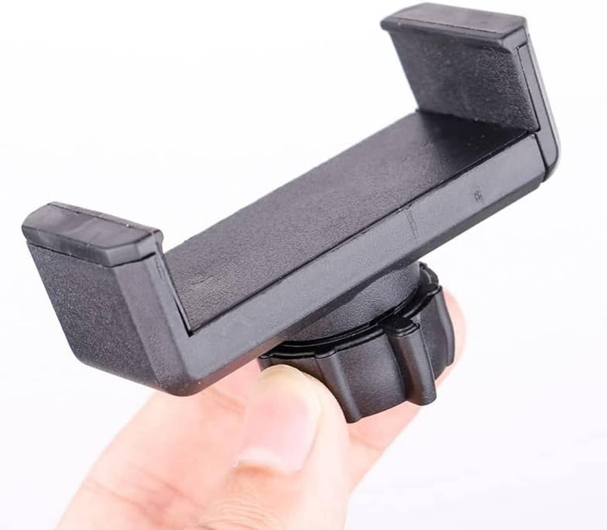 Replacement phone holder clamp with ball joint socket, held by a hand