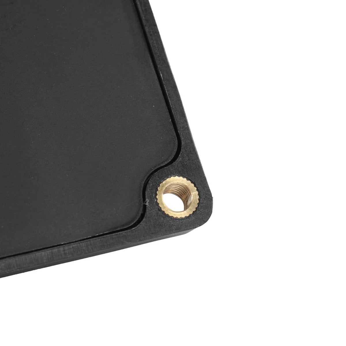 Headlight actuator control relay module corner with metal mounting hole