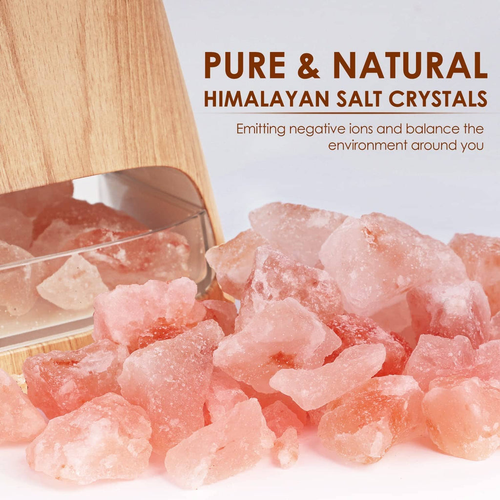 Himalayan salt crystal chamber inside a clear top of a wood-grain essential oil diffuser