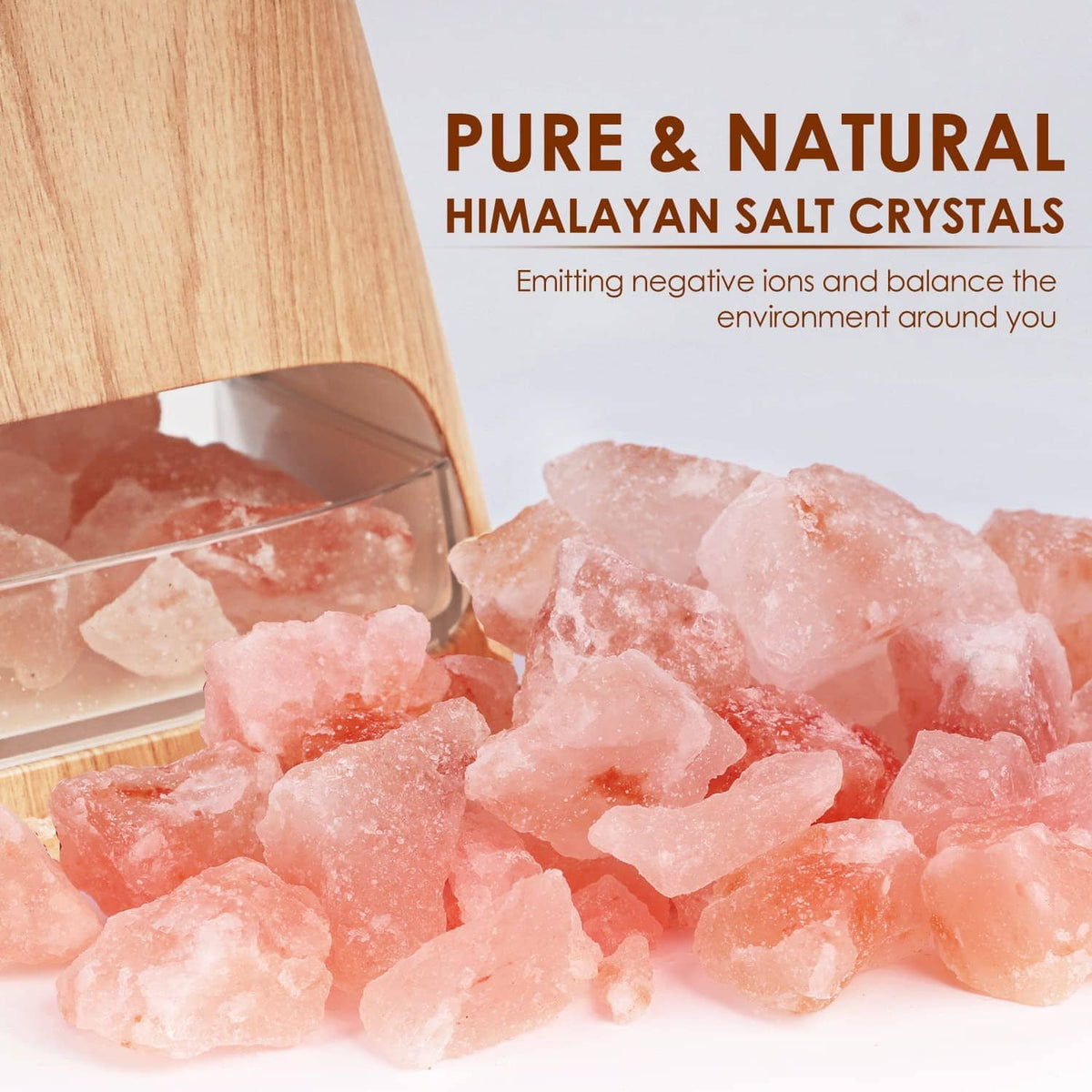 Himalayan salt crystal chamber inside a clear top of a wood-grain essential oil diffuser