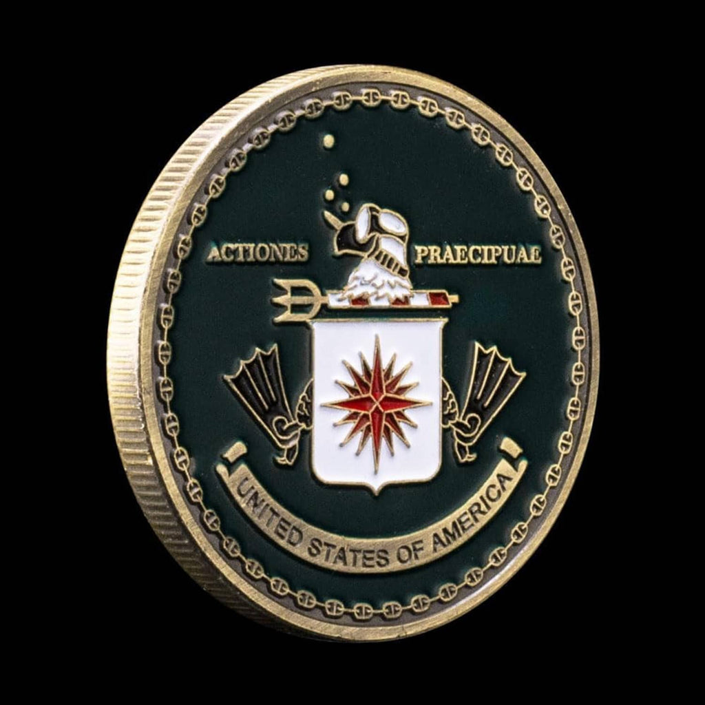 Green military challenge award coin with shield center and crosshair burst emblem