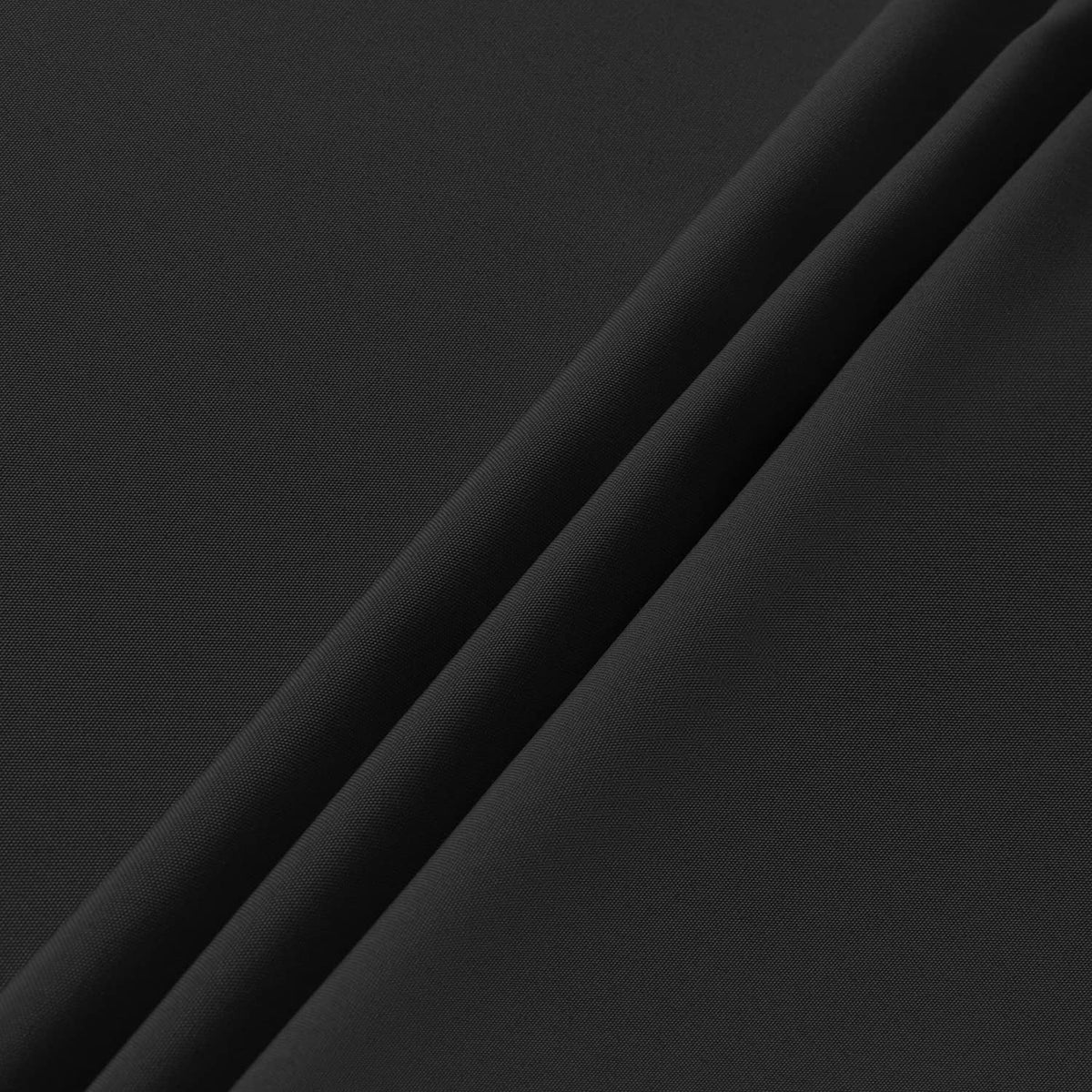 Black fabric panel with diagonal fold texture for tablecloth