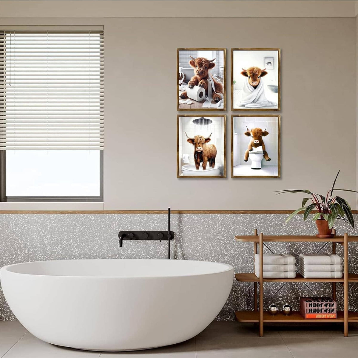 Four small framed Highland cow bathroom prints above a white bathtub