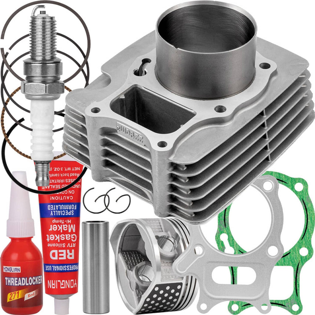 Engine cylinder kit with silver cylinder and piston rings, plus green sealing gasket