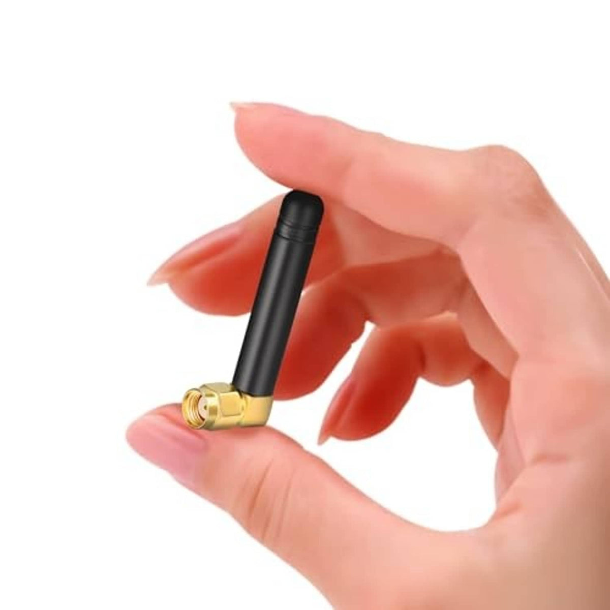 Black dual-band antenna with gold RP-SMA male plug, held by hand for size reference
