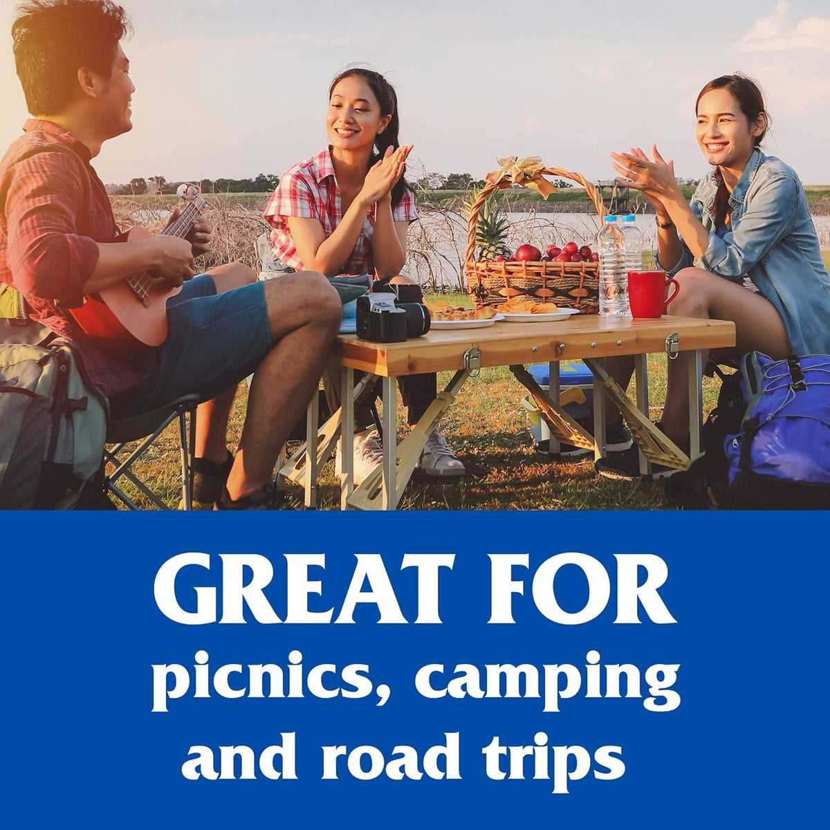 Vienna sausage can on a picnic table with sandwiches and snacks