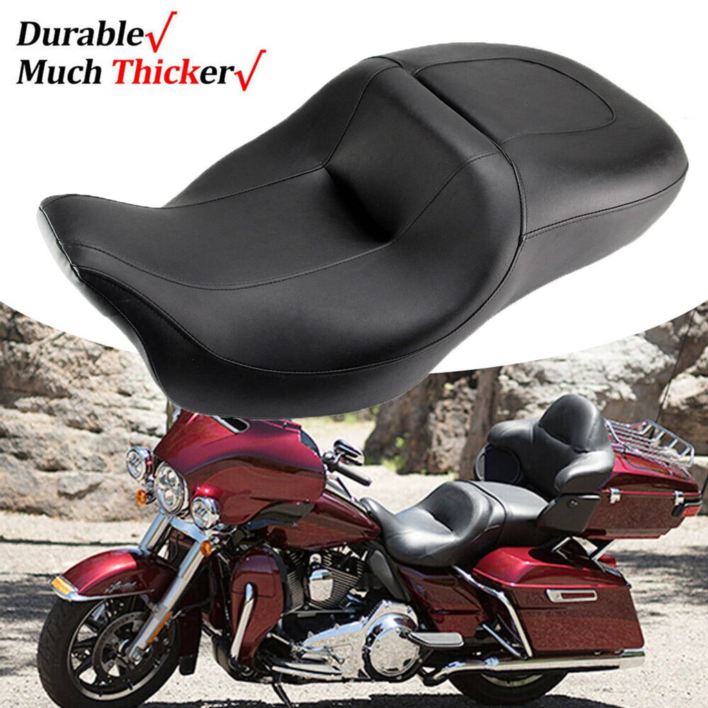 Black 2-up motorcycle seat with raised rider backrest pad and curved passenger seating