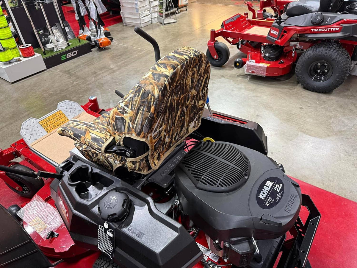 Camouflage mower seat cover and steering area on a Timecutter zero-turn mower