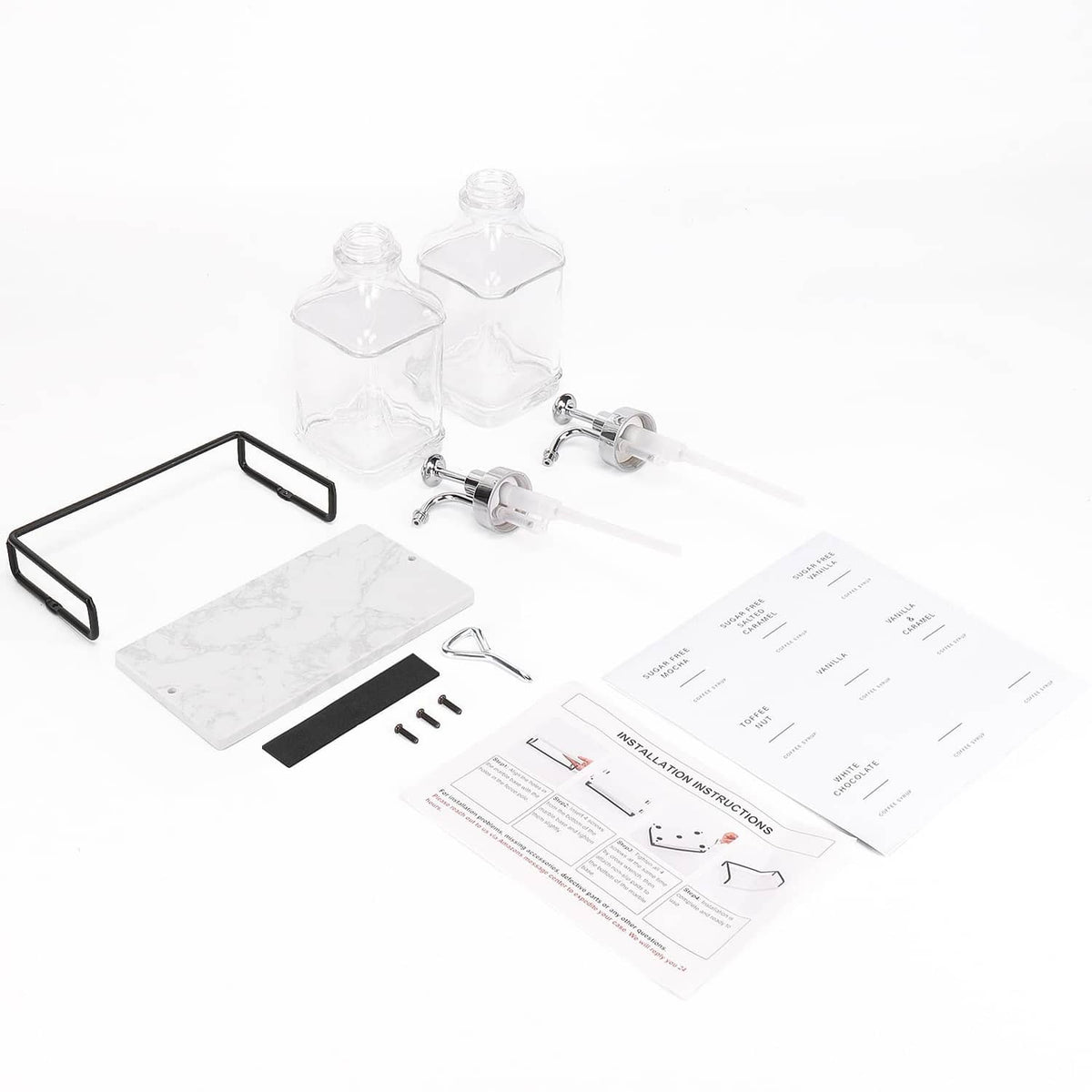 Dispenser bottle set with black tray frame, labels, and instruction sheets