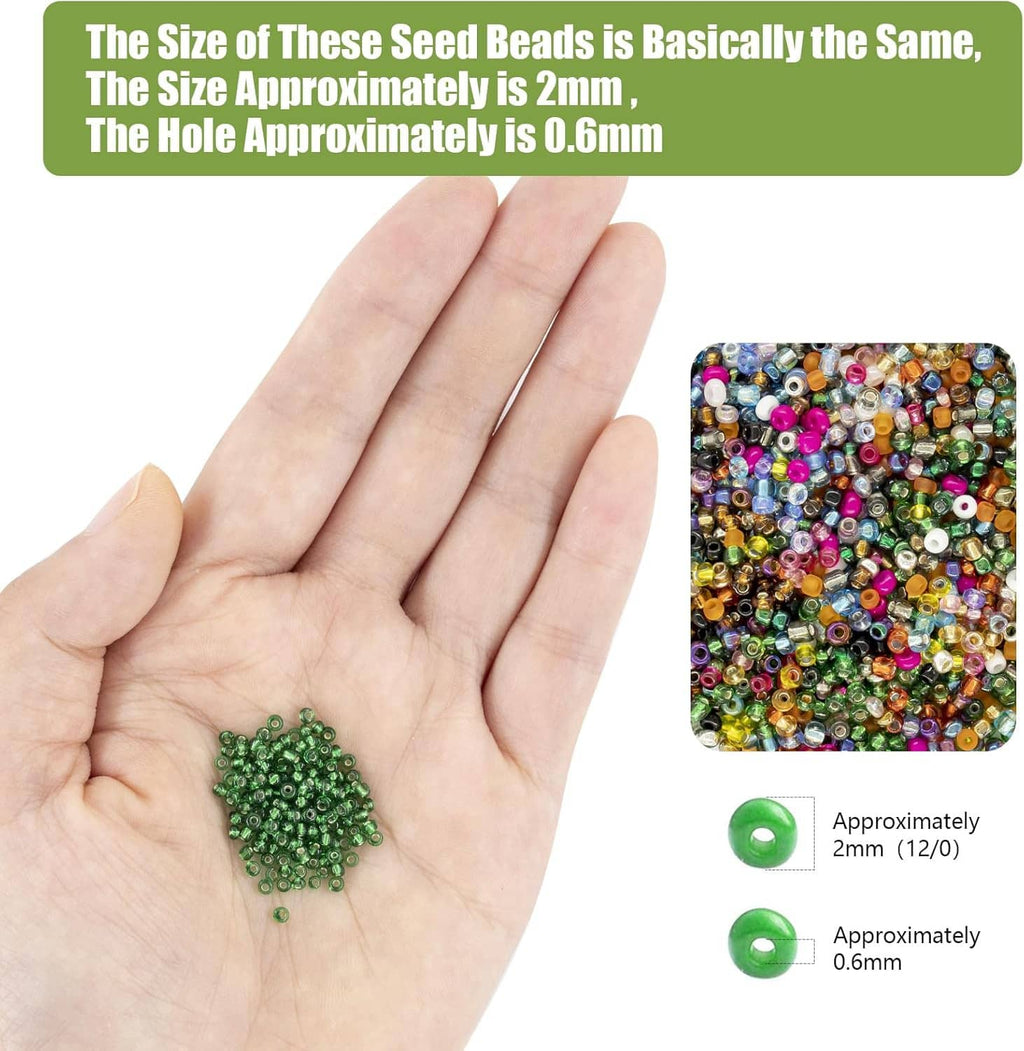 2mm green seed beads held in palm, with 0.6mm bead size shown