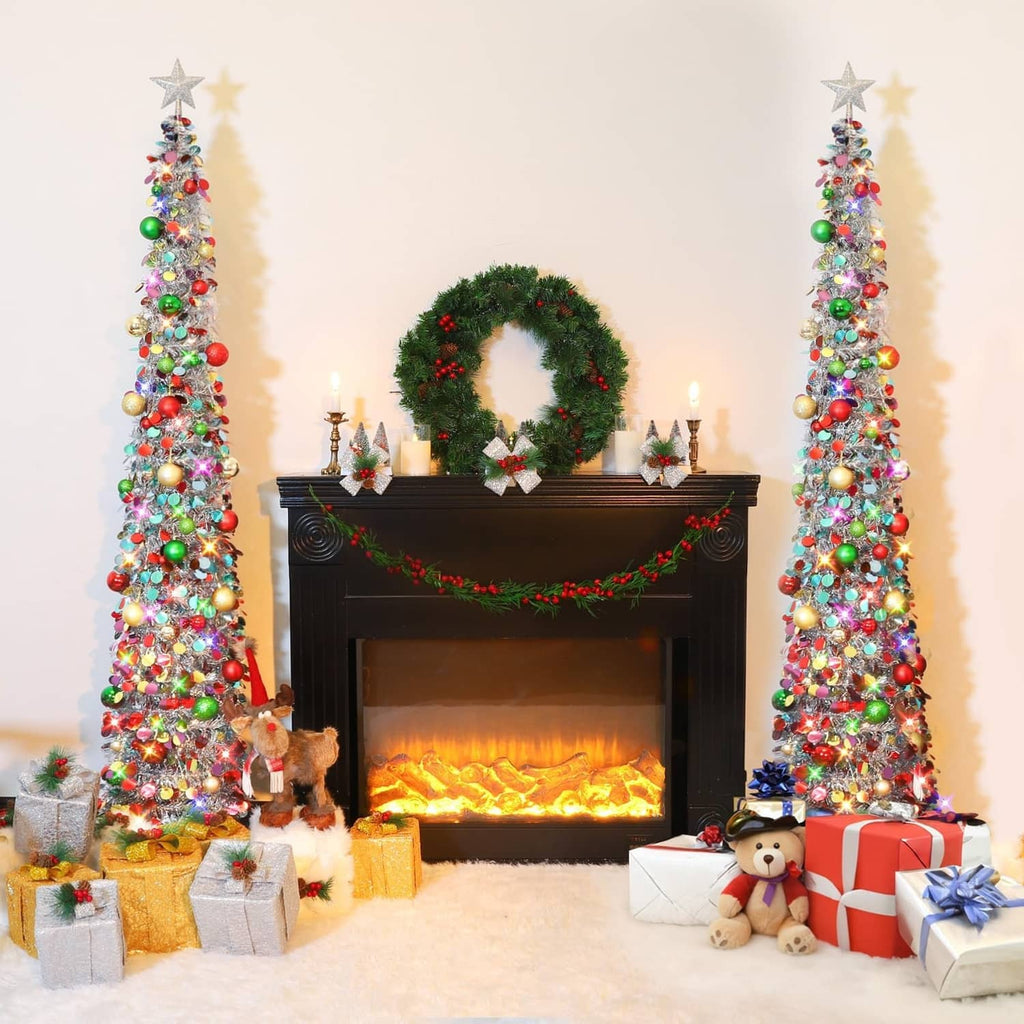 Two silver tinsel Christmas trees with star toppers, multicolor ornaments, and LED lights