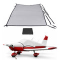 Gray aircraft cabin and windshield cover with black trim and securing straps
