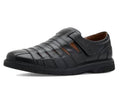 Black leather casual shoes with side strap and stitched panel details