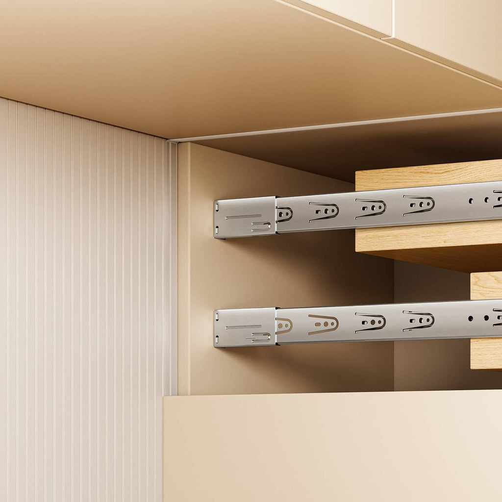Installed side-mount drawer slides on cabinet frame with metal rail and mounting tabs