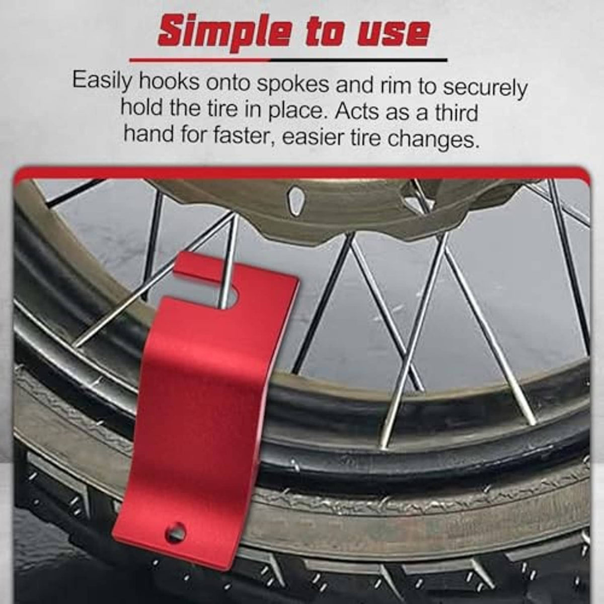 Red tire bead holder hook clipped to motorcycle wheel spokes for securing beads