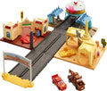 Cars toy track playset with buildings, ramp, and two cars, includes light-up countdown