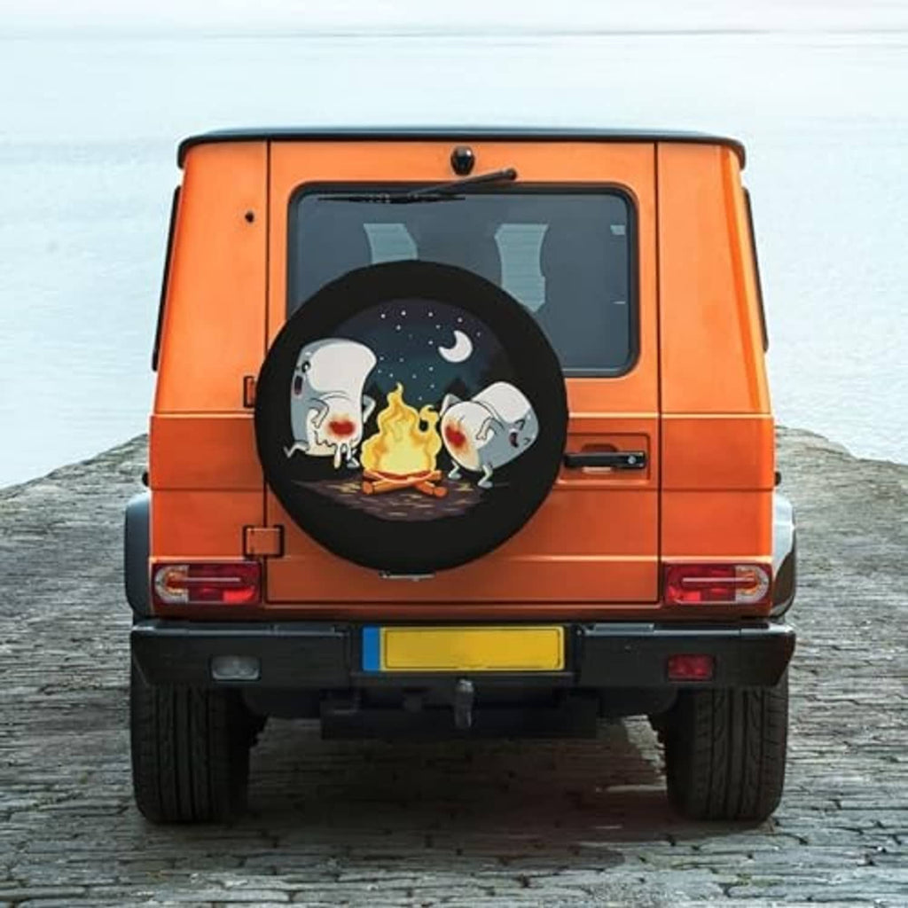 Round spare tire cover mounted on rear spare wheel with campfire animal graphic