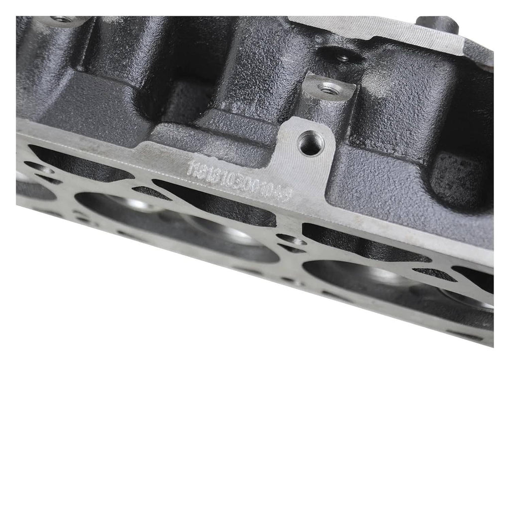 Cylinder head close-up with stamped marking and mounting bolt boss