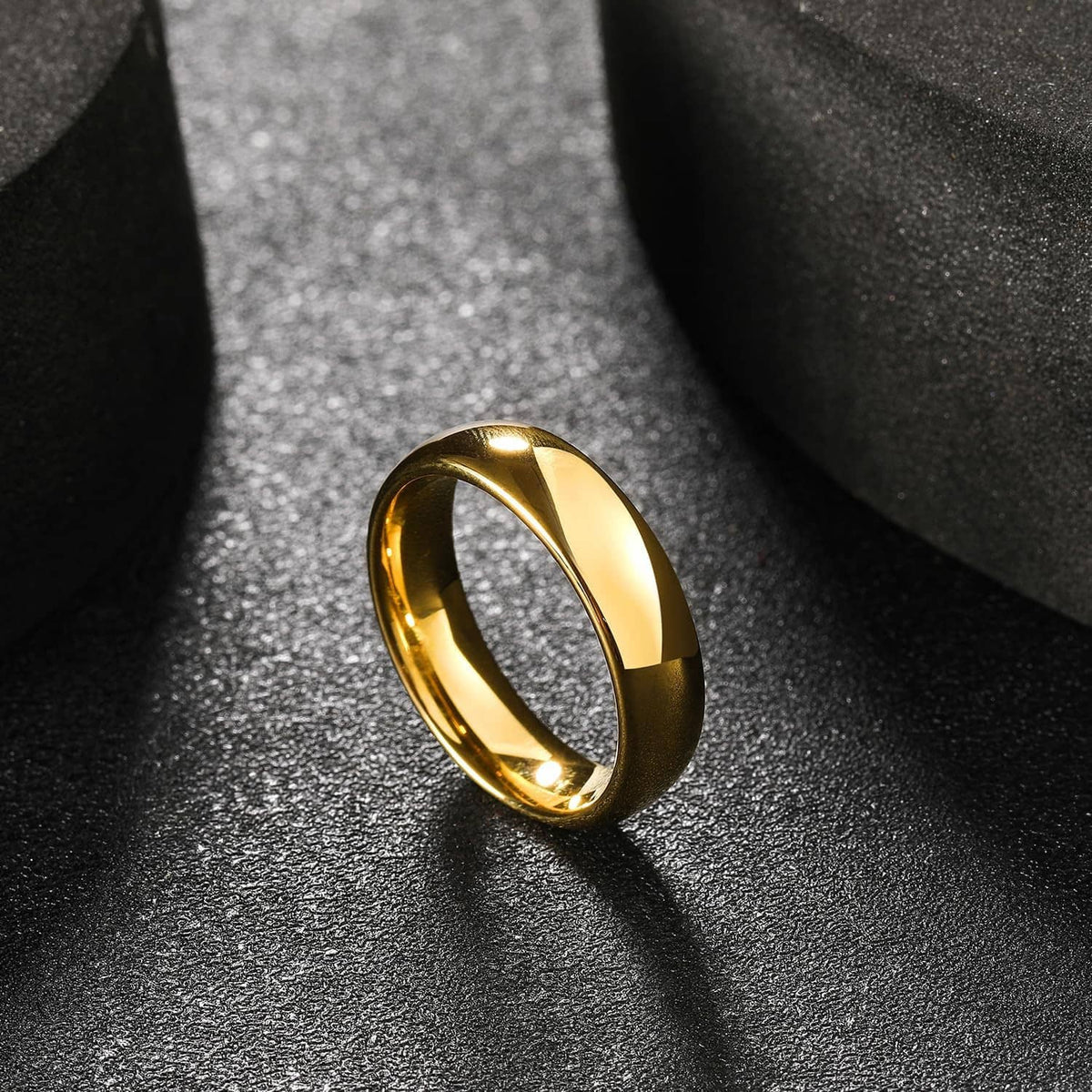 Gold plated tungsten carbide ring with glossy sheen, rounded profile