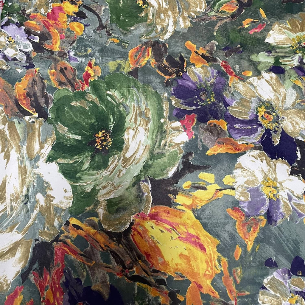 Close-up of floral curtain fabric in green with colorful painted-style flowers