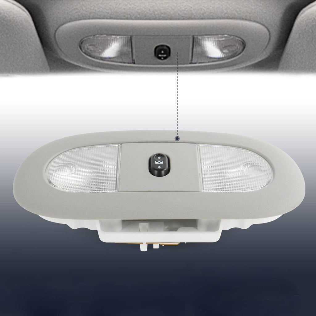 Overhead console LED light with clear lens and black sunroof switch, mounted in ceiling