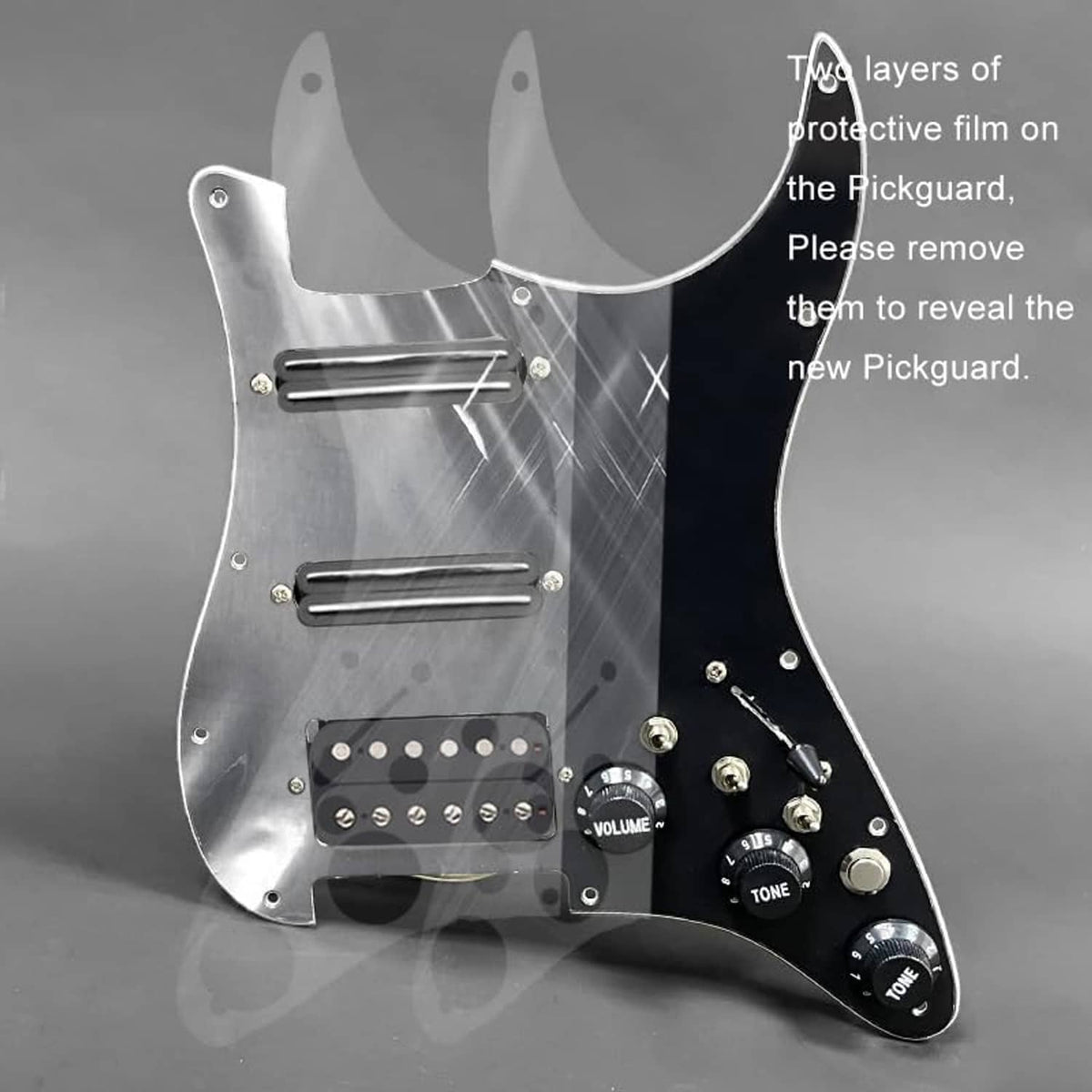 Black electric guitar pickguard with three humbucker pickups and protective film layer