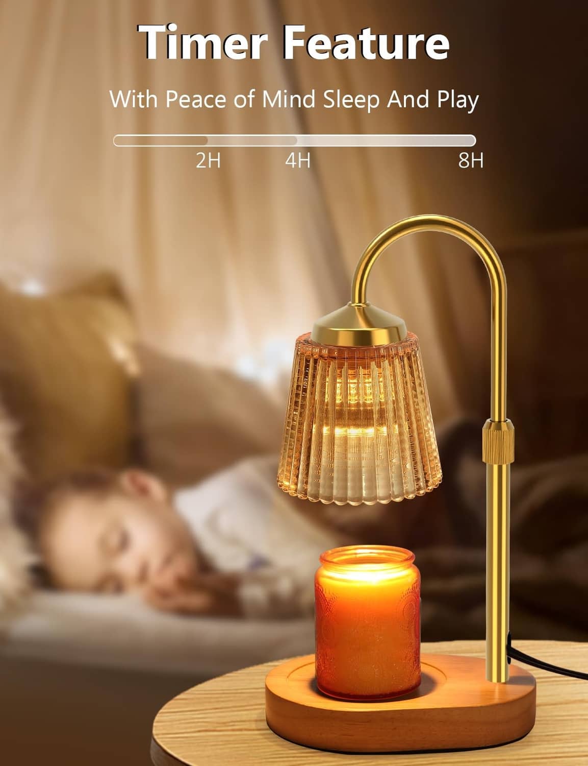 Gold candle warmer lamp with timer feature warming a glowing jar candle on a wood base