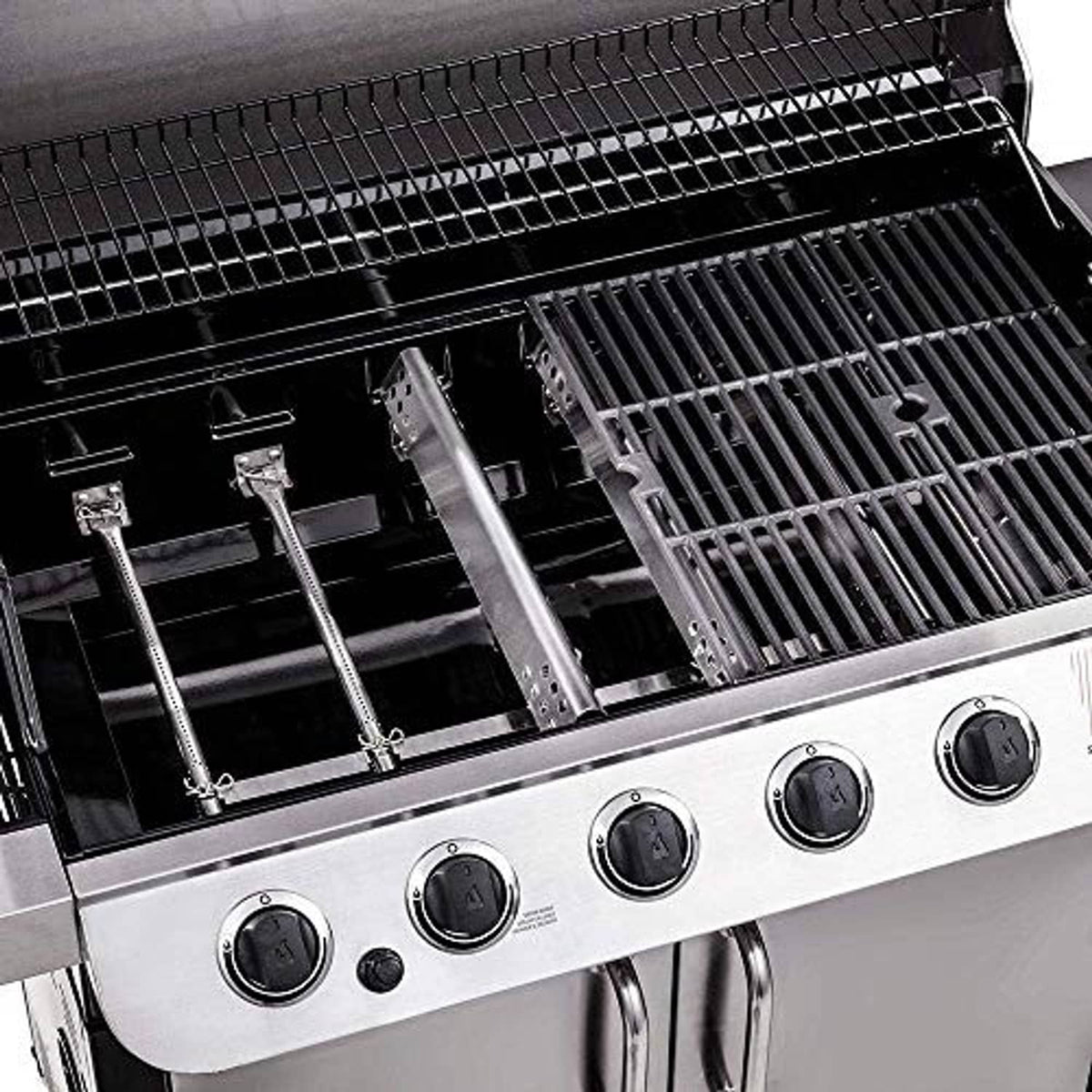 Stainless steel grill heat plates and burner tubes installed in cooking chamber