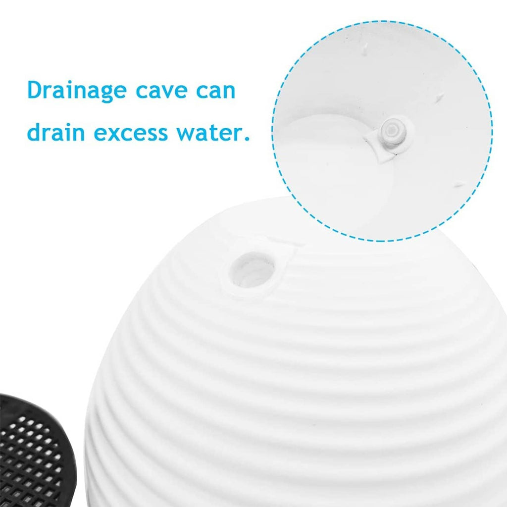 White hanging planter with chain attachment and round drain opening