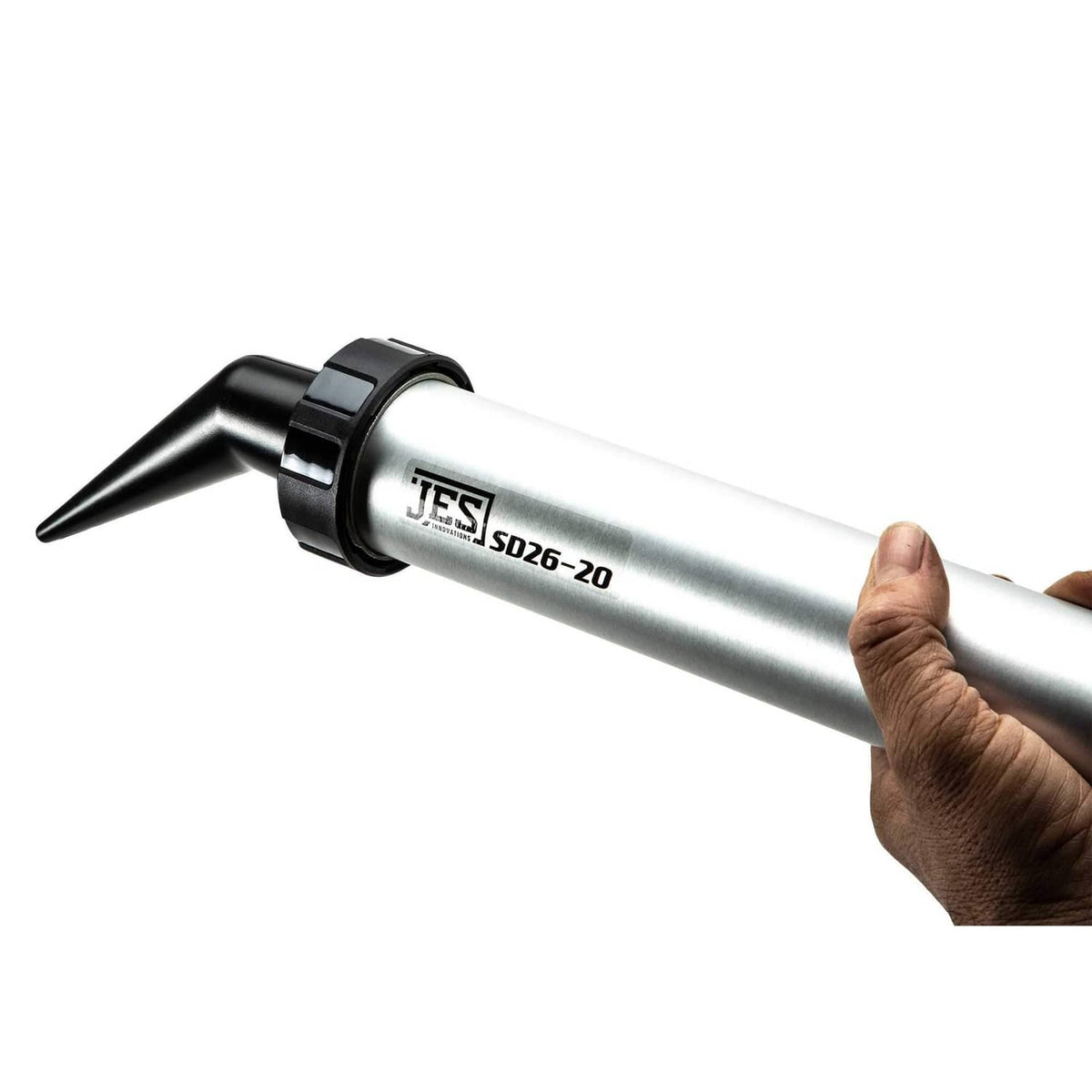 Angled nozzle with silver barrel and black collar, held in hand