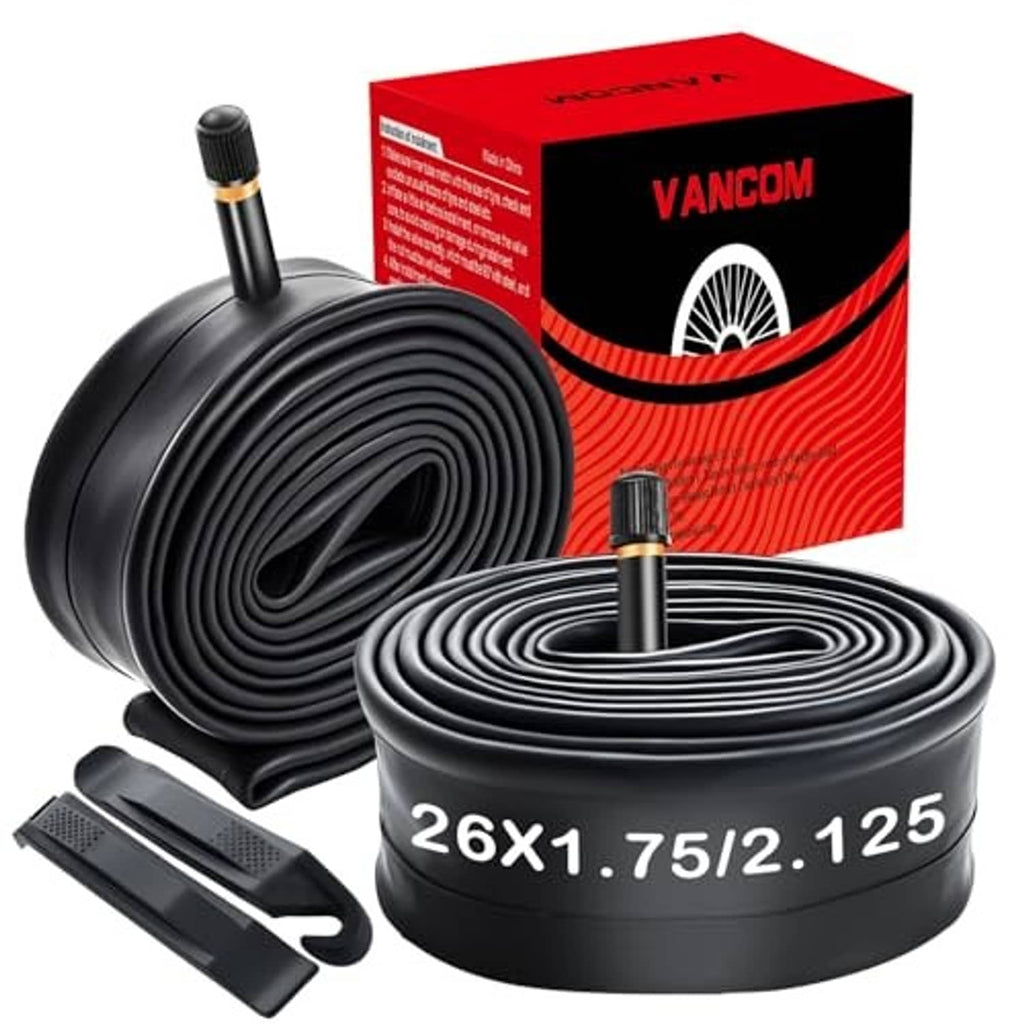 Two black bike inner tubes with valve stems, plus tire lever and mounting tools