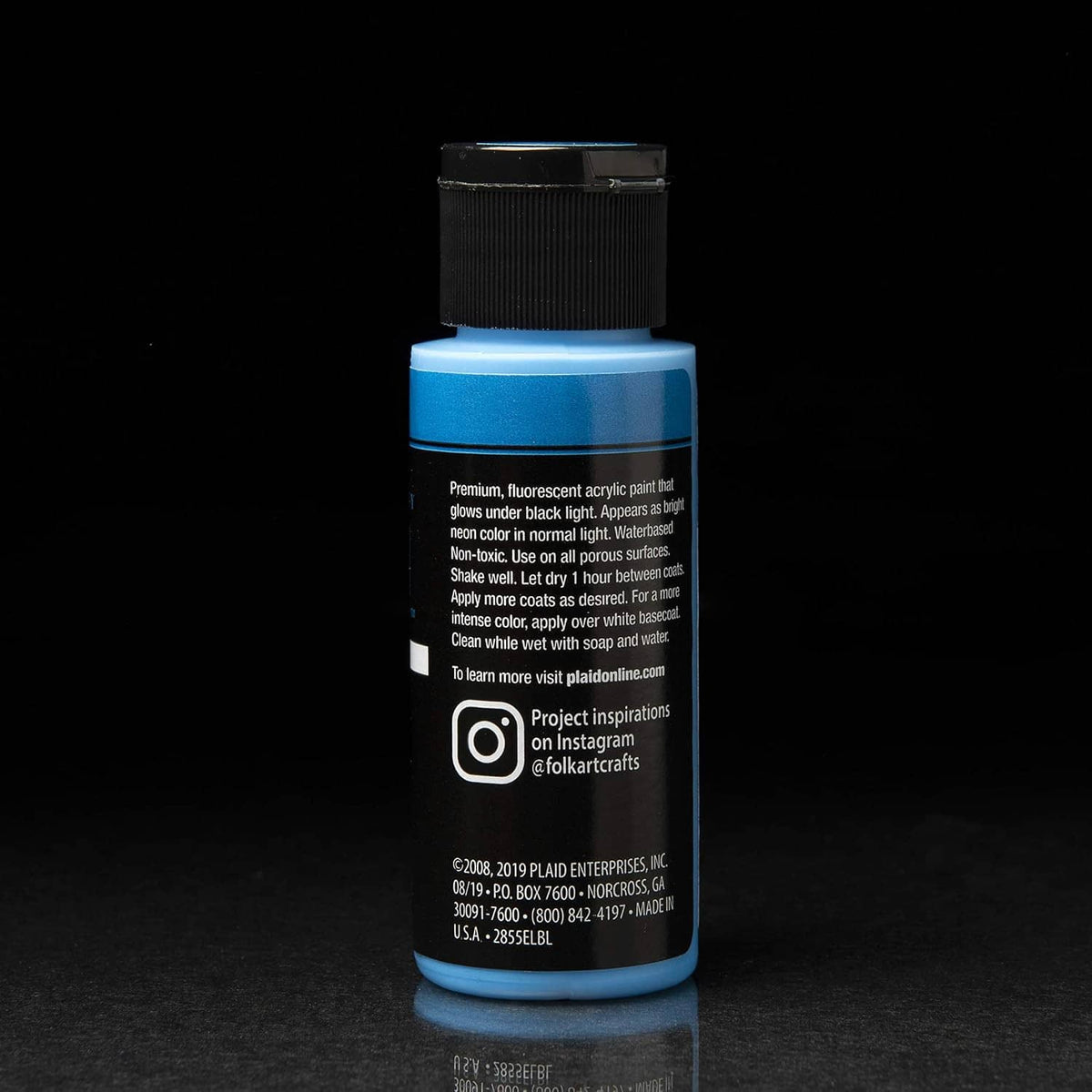 Back view of neon blue neon blacklight acrylic paint bottle with label text
