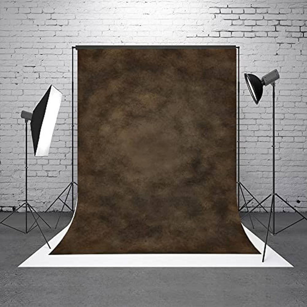Dark brown mottled texture photography backdrop hanging on light stands