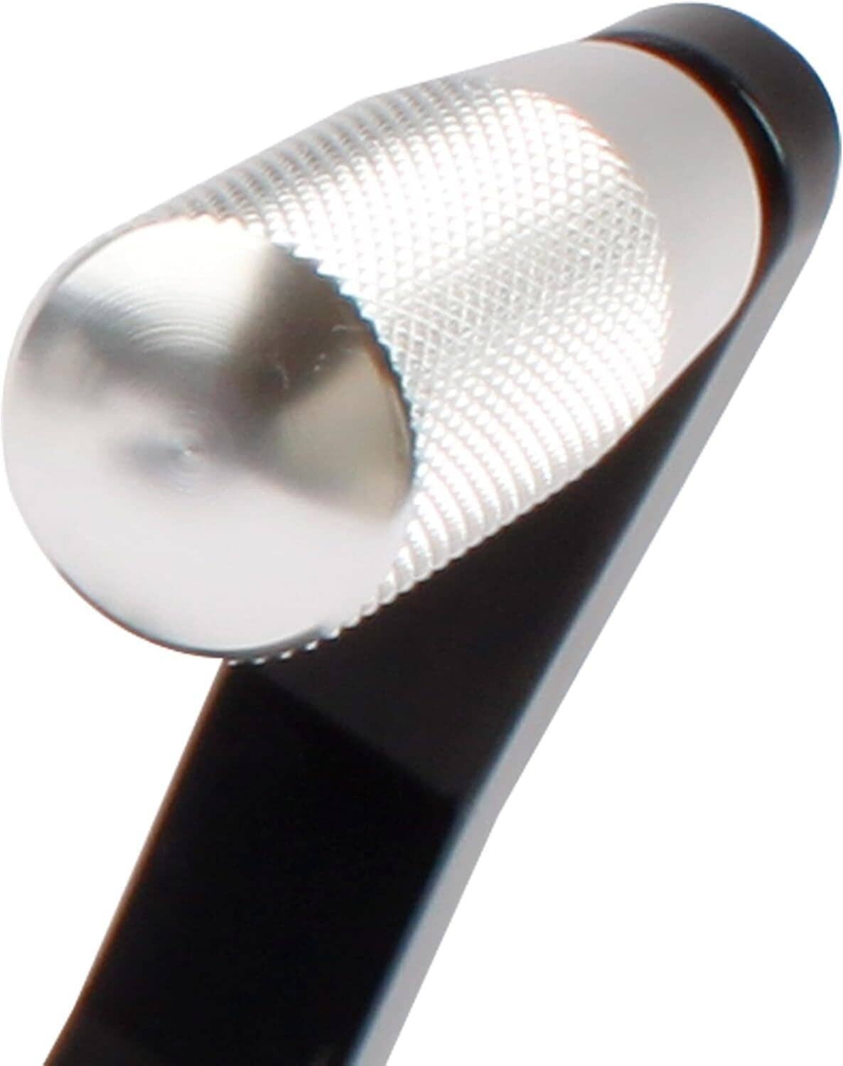 Pipe bead roller tool close-up of silver textured roller head and black arm