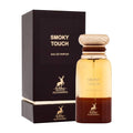 Men’s smoky touch eau de parfum bottle with box; amber glass and gold cap