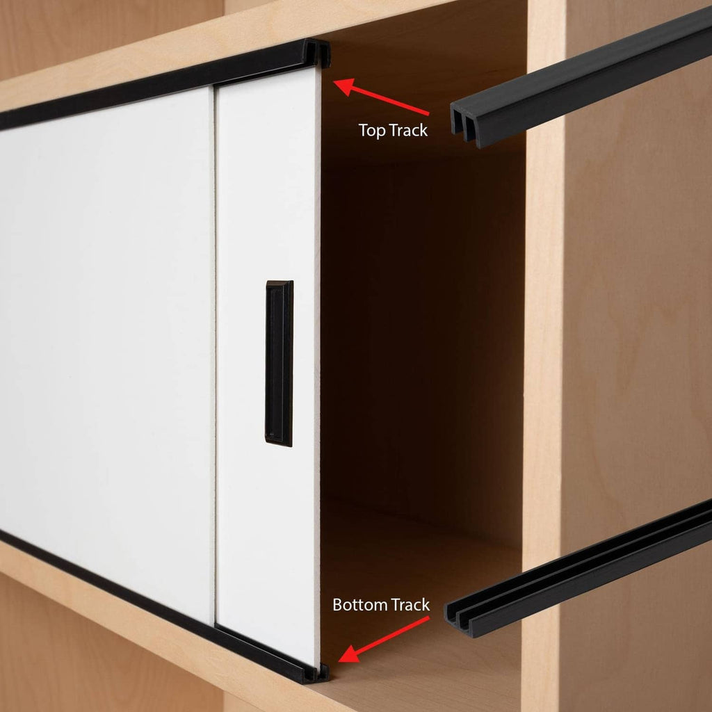 Black plastic sliding door top and bottom tracks installed on wood panel