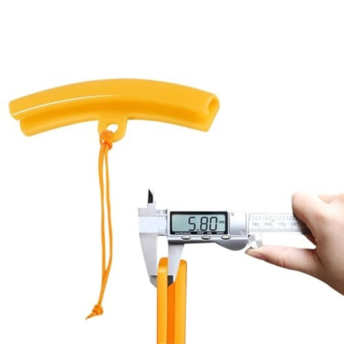 Orange tire rim protector guard next to a caliper measurement