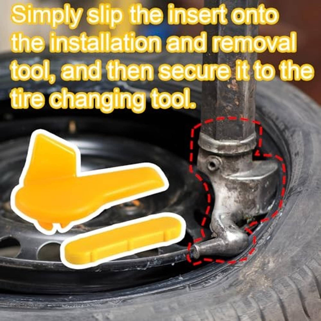 Yellow plastic rim protector insert positioned on a tire changer tool near the wheel edge