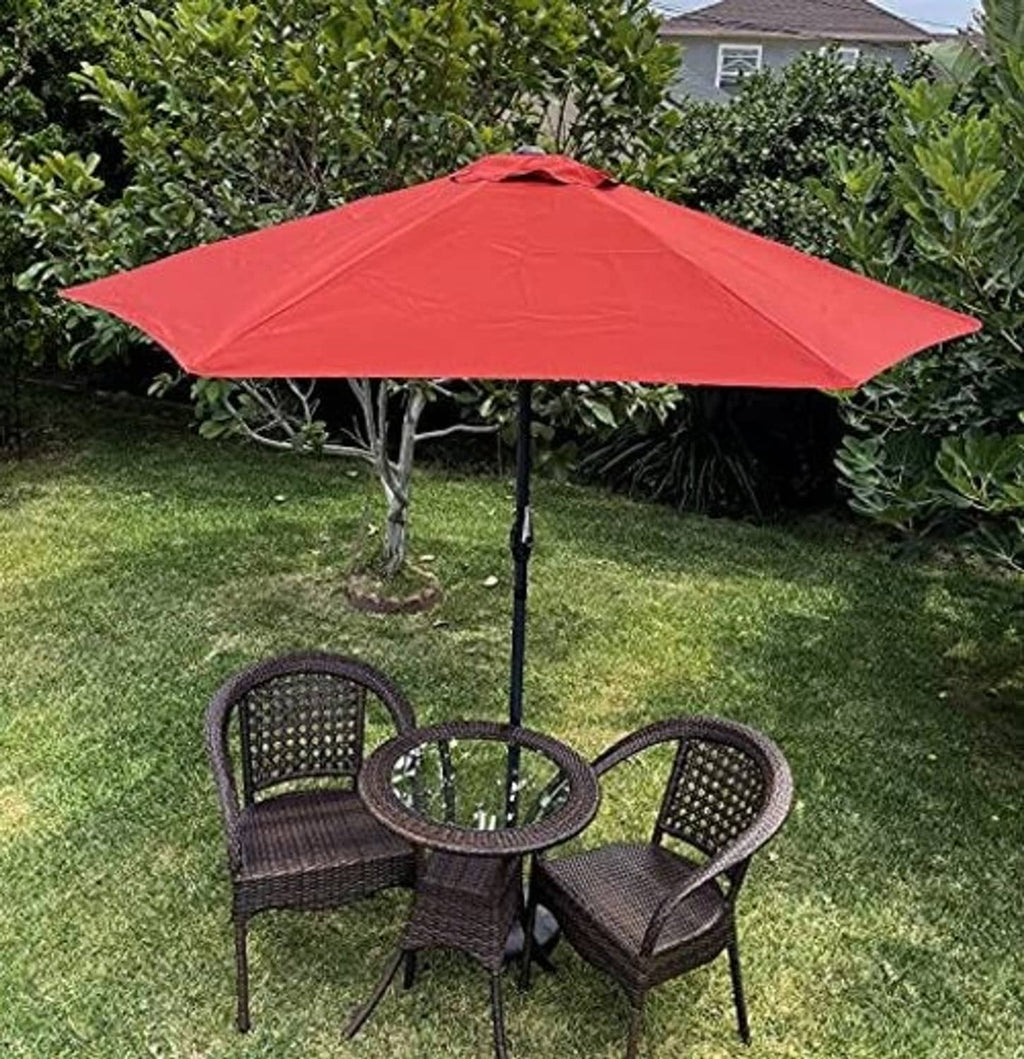Brick-red patio umbrella canopy with central finial and ribbed panels