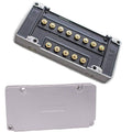 Grey outboard CDI ignition module with gold terminal pins and mounting screw posts
