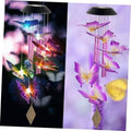 Butterfly solar wind chimes with glowing LED butterflies on a pink vertical frame