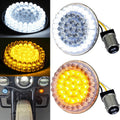 Pair of round LED turn signal lights with clear lens, silver socket, and wire leads (white/amber)