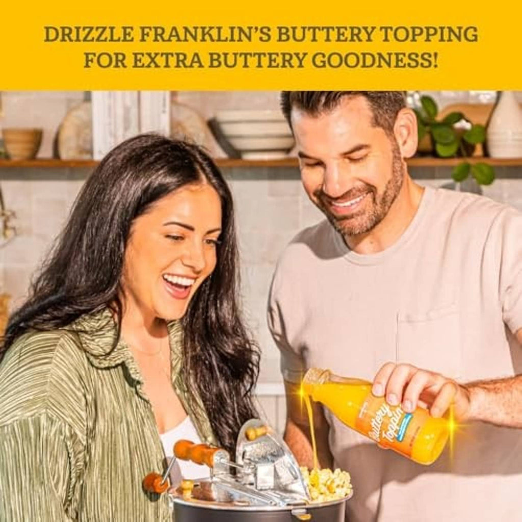 Organic popcorn kernels jar with black lid poured over popcorn, couple enjoying snack.