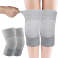 Pair of gray knee sleeves with ribbed compression bands and smooth knit
