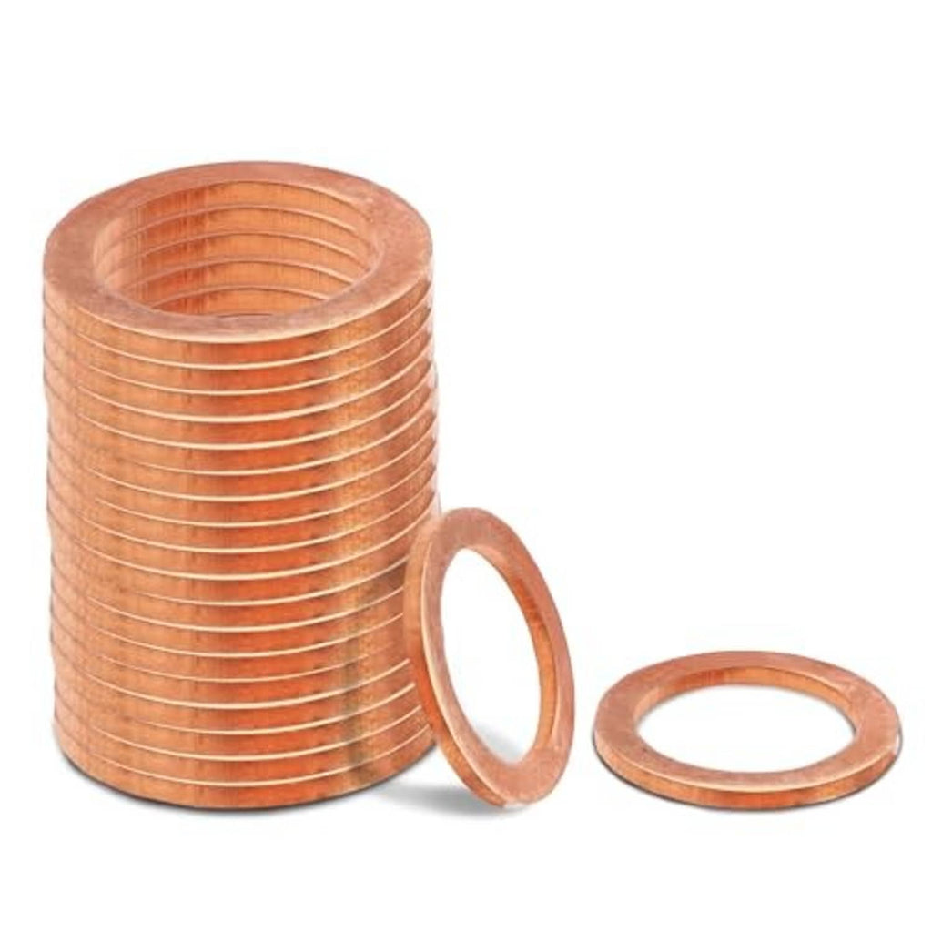 Copper oil drain plug washers, stacked and loose pieces with round center openings