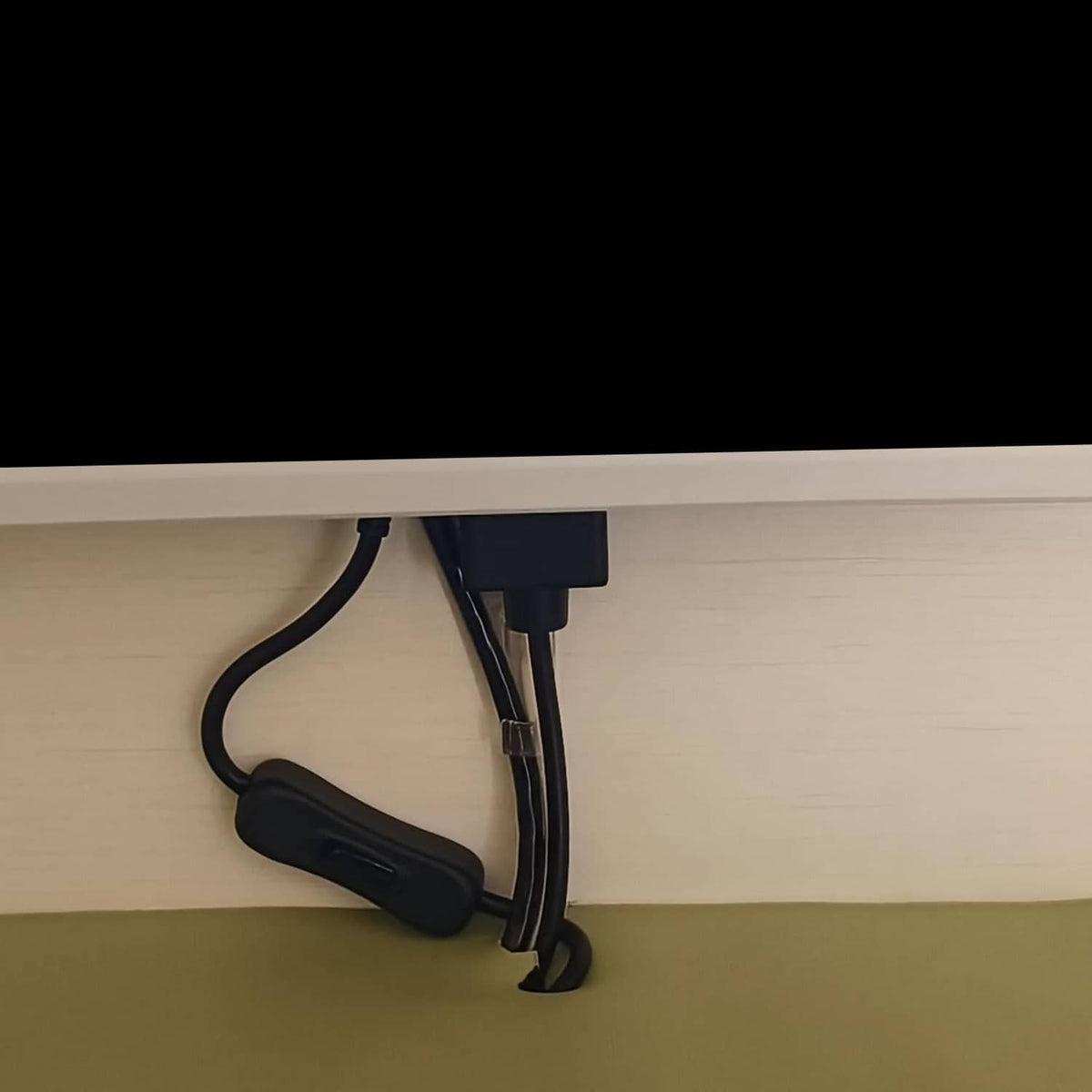 Black inline on/off switch cable with DC plug, used for under-cabinet lighting