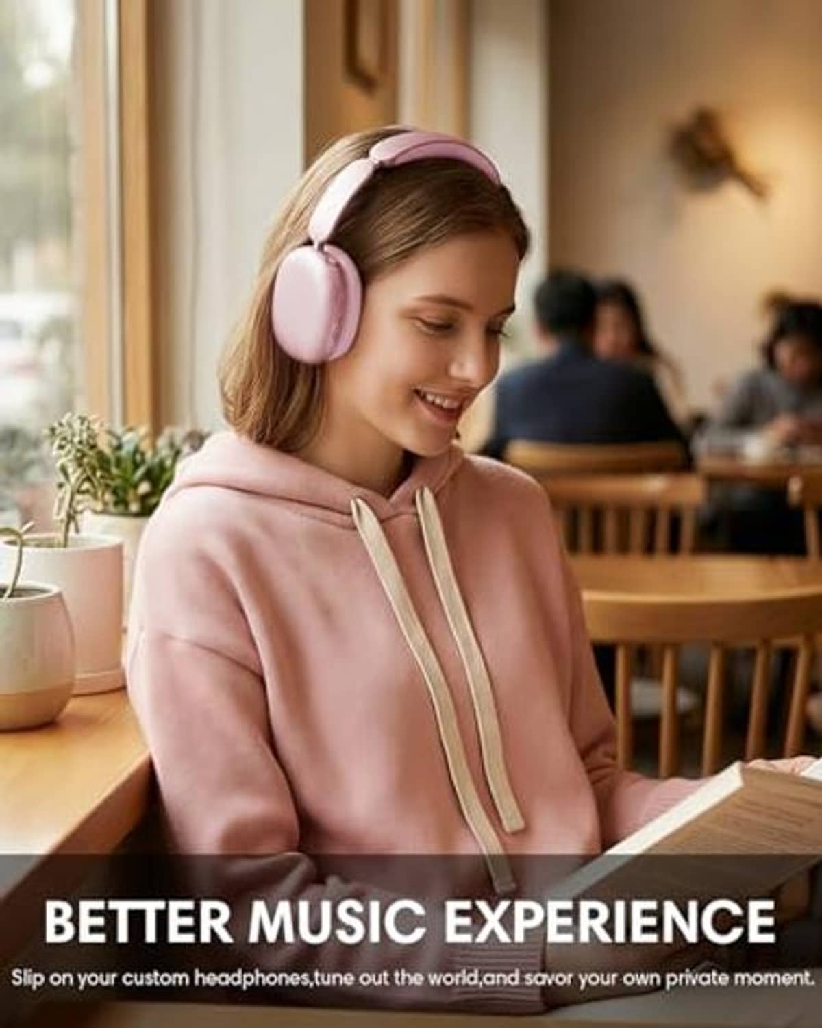 Woman wearing pink over-ear wireless noise-cancelling headphones while reading